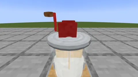 La baratte, remplie de lait.