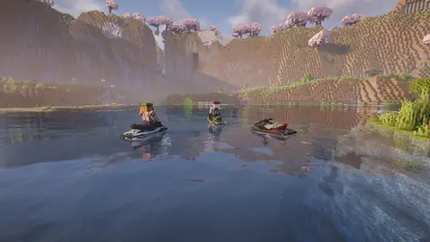 Trois jet-skis sur le lac.